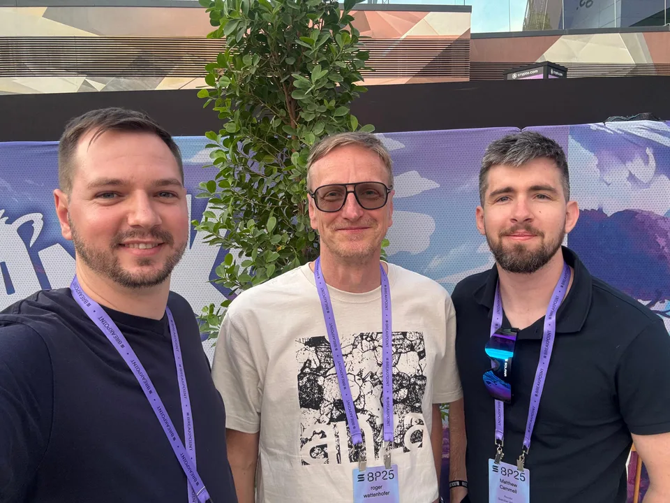Three attendees together at Breakpoint 2025 in Abu Dhabi.