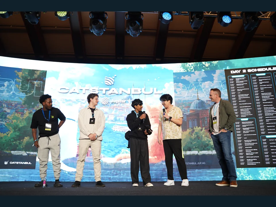 Five participants on the Catstanbul main stage in front of the event backdrop.